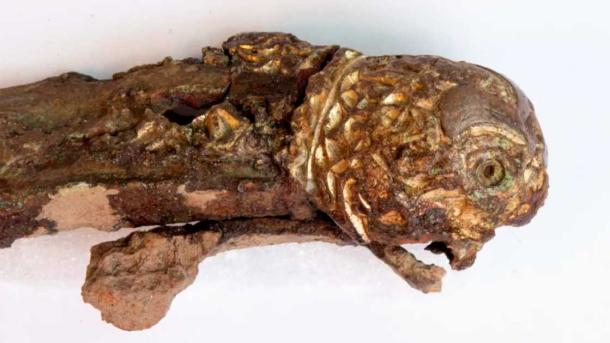 Both ends of the crossguard depict an animal head. (Lise Chantrier Aasen/Stavanger Museum)