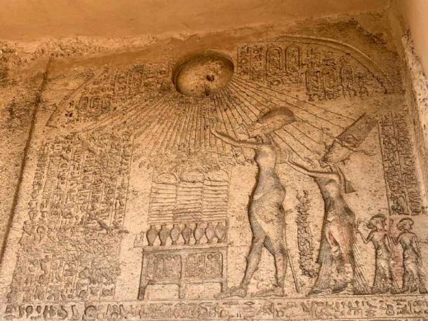 The top of the Boundary Stela A at Tuna el-Gebel, showing Akhenaten, Nefertiti, and their children worshipping the sun god, Aten. (Author’s own photo.)