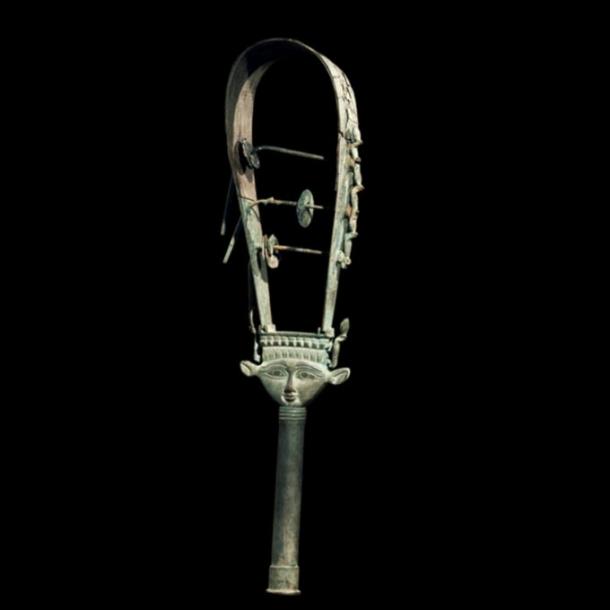 Music for the Gods: Bronze arched sistrum with Hathor head decoration, representational image only. 