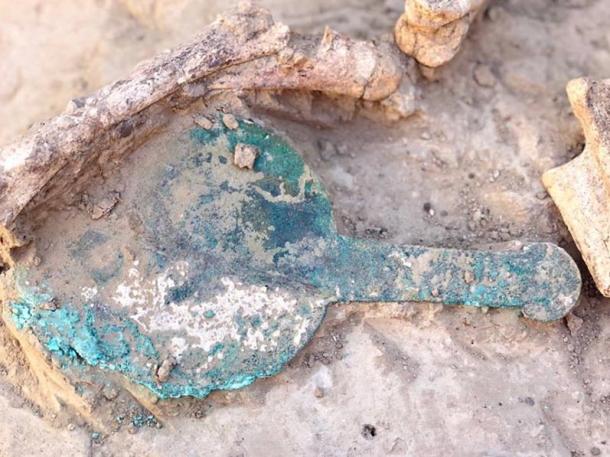 Bronze mirror found in the Amazon burial site. 