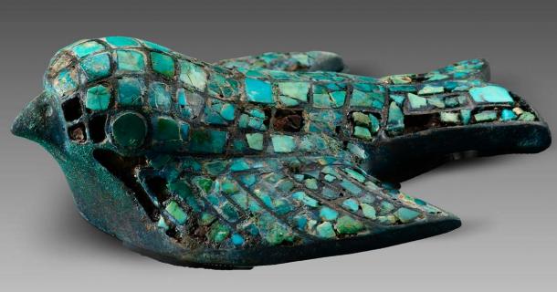 Bronze bird figurine inlaid with pieces of turquoise unearthed from the elite tombs at the Zhaigou site. (Image credit: Shaanxi Academy of Archaeology)