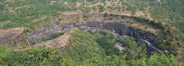 Another Buddhist cave site in India is the Ajanta Caves, seen here from across a nearby river.