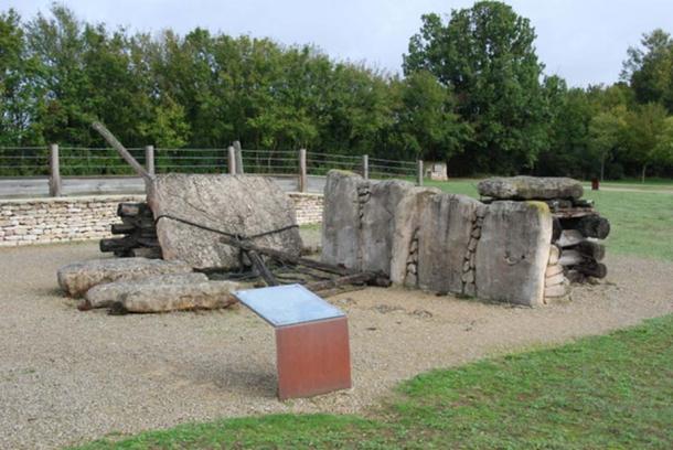 Building a tumulus, here showing how the walls of the burial chamber were constructed from large stones and megaliths