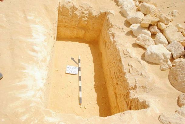 Burial hole and sarcophagus of a child (Photo: Nevine El-Aref)