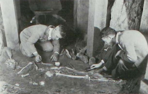 Burial in Spearhead Mound including a white chalky substance. Walker is on the left. (James L. Murphy)