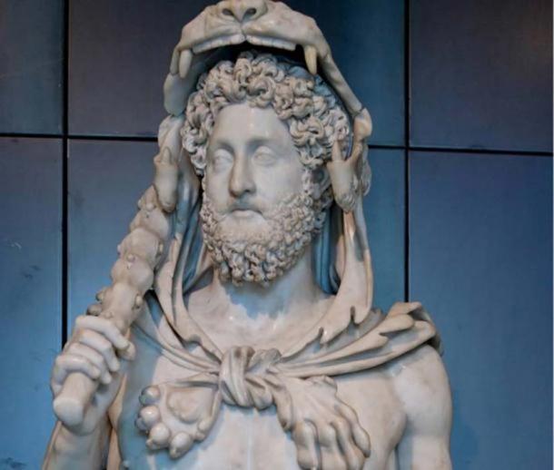 Bust of Commodus as Hercules, hence the lion skin, the club. Roman Artwork. (Public Domain)