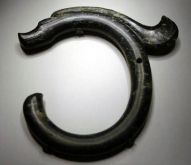 The C-shaped jade dragon of Hongshan Culture.