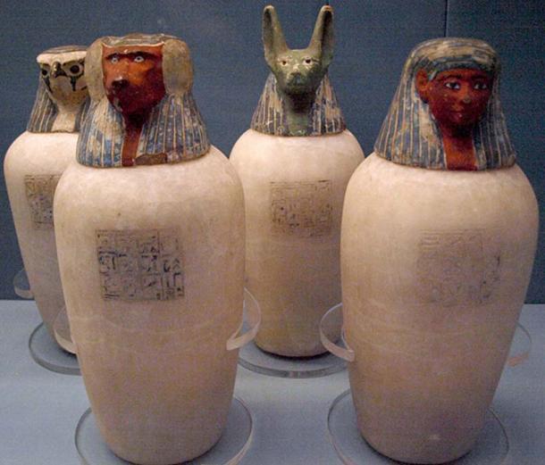 Canopic jars of Neskhons, wife of Pinedjem II. Made of calcite, with painted wooden heads. Circa 990–969 BC. On display at the British Museum. 