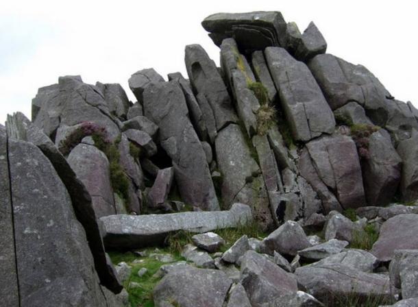 Carn Menyn bluestones. These dolerite slabs, split by frost action, seem to be stacked ready for the taking, and many have been removed over the centuries for local use