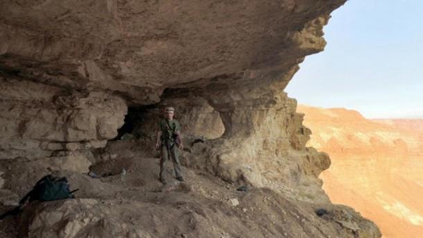 An official at the Cave of Skulls 