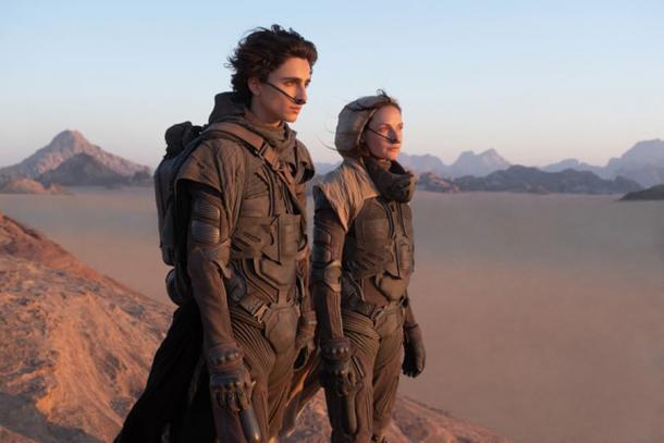 Timothée Chalamet and Rebecca Ferguson in the science fiction film Dune, whose desolate desert climate scenes were shot in Jordan and the UAE. (Warner Bros)
