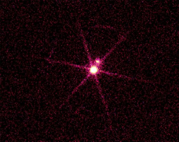 The Chandra X-ray image of Sirius A & B, a double star system located 8.6 light years from Earth, shows a bright source and a dim source. This is not visible with the naked eye. (Smithsonian Institution)