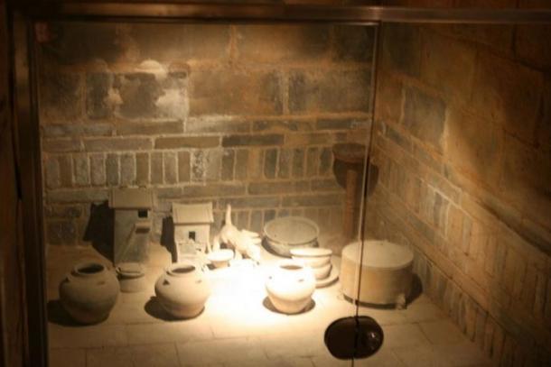 A sealed Chinese tomb with grave goods such as jars and miniature buildings, in Luoyang, Henan Province, China, built during the Eastern Han Dynasty (25–220 AD)