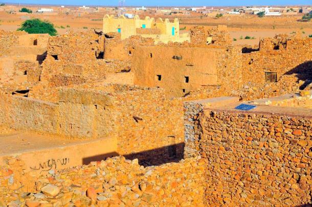 Chinguetti, Mauritania. Source: robnaw / Adobe Stock. Chinguetti is an abandoned medieval trading center in northern Mauritania. It was founded in the 13th century as the center of several trans-Saharan trade routes. It is known for its architecture, scenery, and ancient libraries. The city is threatened by the encroaching desert.