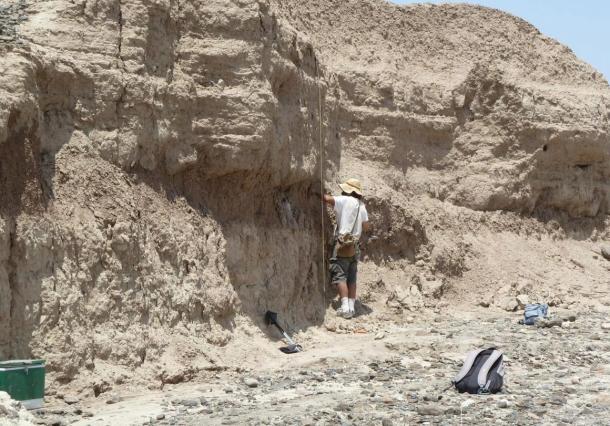 The stone tools were precisely dated by analyzing soil layers around the finds. Chris Lepre of Columbia University's Lamont-Doherty Earth Observatory (back to camera).