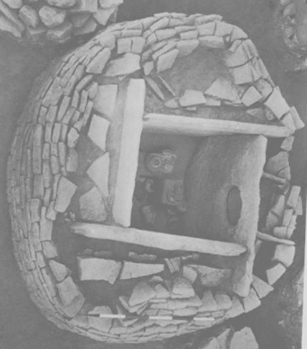 Cist burial – from Brahmagiri where that are many thousands of similar monuments the porthole, diameter 1.5-2ft in diameter, orientated east to rising sun – it is too small to be the entrance but is approached by a downward ramp and is likely a soul-door to allow communication between the worlds of the living and the dead.
