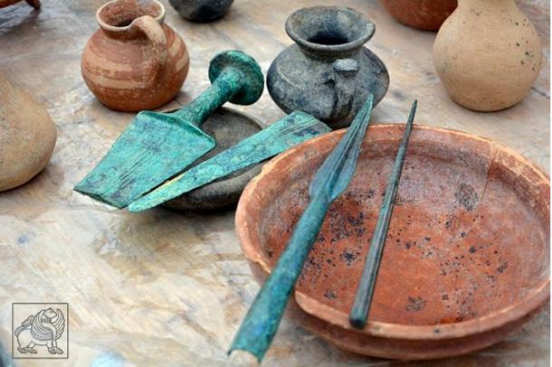 Clay vessels and bronze weapons uncovered at Grakliani Hill, which has been under excavation for eight years.
