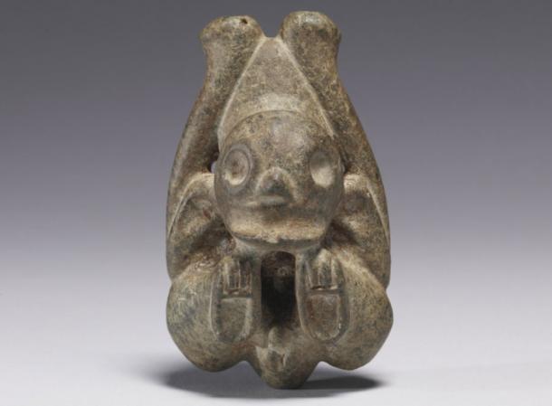 Cohoba, a hallucinogen made of ground tree seeds, was used by Taino shamans. Users put cohoba powder on a carved pedestal and inhaled through the nose via an inhaler like this piece, from between 1000 and 1500 A.D. This carved stone shows a shaman or behique in a trance.