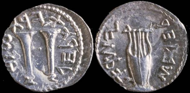 Coin from Jewish Bar Korkhva revolt. Description: on one side trumpets surrounded by writing 