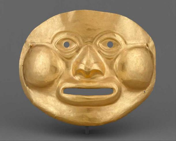 Funerary mask, 5th–1st century BC, Calima (Ilama), Colombia. Calima masks of the Ilama era are often flat, with generic details of the human face. On this example, the features are individualized with puffy bags beneath the eyes, a broad nose with flared nostrils, big, round, bulging cheeks, and a fat-lipped open mouth. (Met Museum / Public Domain)