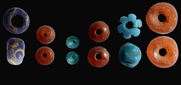 Colored beads that were uncovered in the archaeological excavation inside the dolmen.