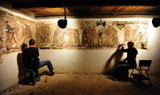 Conservation work on the Ixil Maya wall paintings in house #3 in 2015. (Source: R. Słaboński / Antiquity Publications Ltd)
