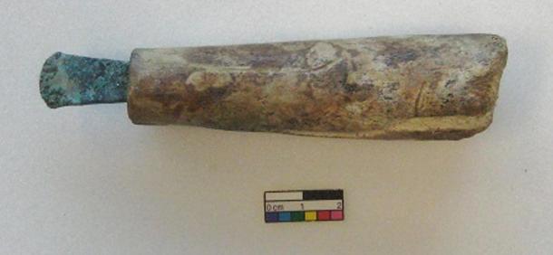 Copper chisel with bone handle.