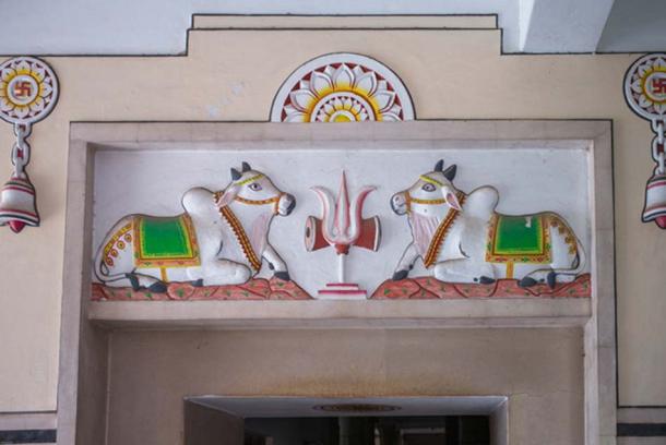 Cows painted over a door are believed to bring good luck.