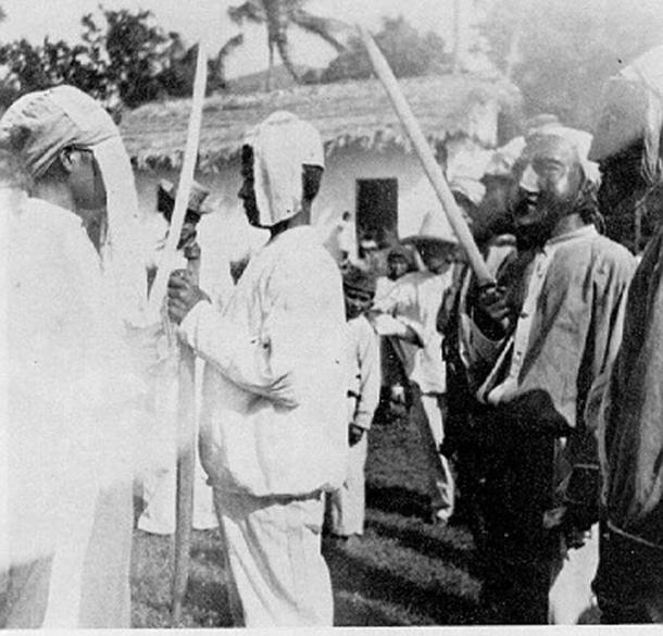 Scene from the traditional ‘Dance of the Giants’ showing Gavite and the Black Giant, amongst other characters.