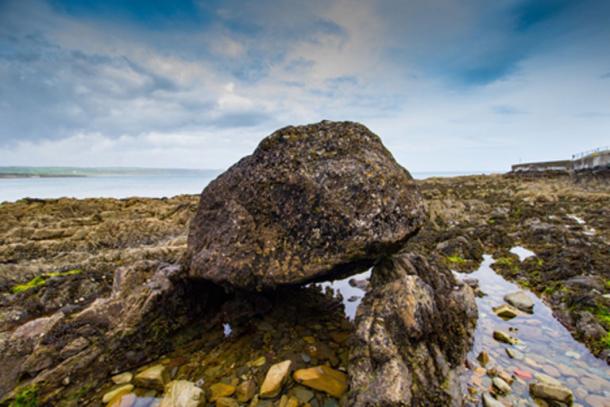 Declan's Stone, one of the pagan cursing stones that was inducted in Christianity. (Matthew / Adobe)