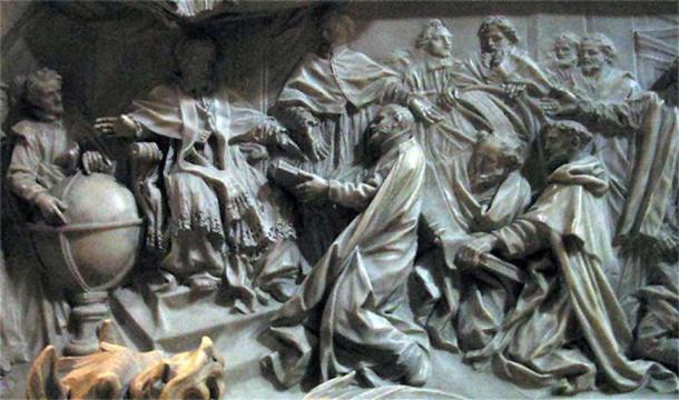 Detail of by Pope Gregory XIII’s tomb by Camillo Rusconi (completed 1723); Antonio Lilio is genuflecting before the pope, presenting his printed calendar.