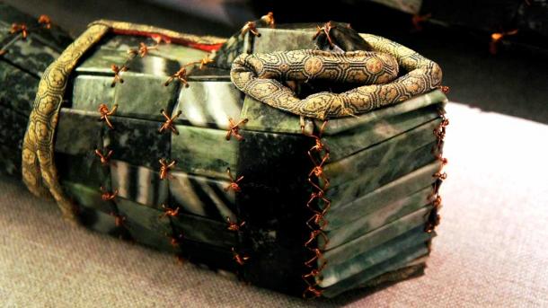 Detail of the hand section of the jade burial suit of Liu Sui, Prince of Liang, of Western Han (Zcm11 / CC by SA 3.0). In Han Dynasty China, elaborate ceremonial suits were created with polished pieces of jade, which were used for royal burials. In 1983, archaeologists found one of the most valuable jade suits in history. The suit belonged to Prince Huai and was made of 1203 pieces of jade and 2580 grams of golden thread.