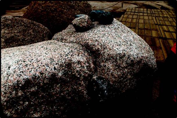 Dolorite pounders on top of a piece of pink Aswan granite. (Author provided)