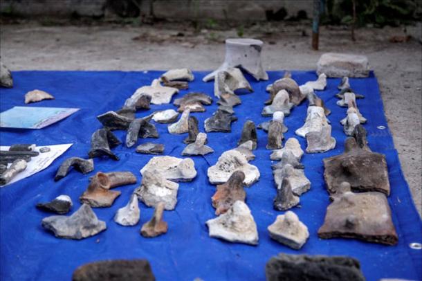 Dozens of artifacts were raised from the lake, which was located on the ancient Old Silk Road.
