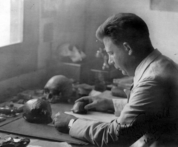 Dr. G.H.R. von Koenigswald studying fossils from Java c. 1938. 
