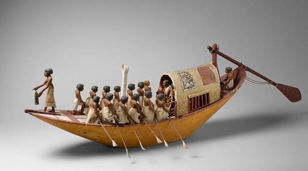 Egyptian traveling boat being rowed.