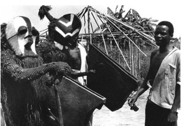 Elders in ritual masks; village kikomo, kiloshi chiefdom, Eastern Songye