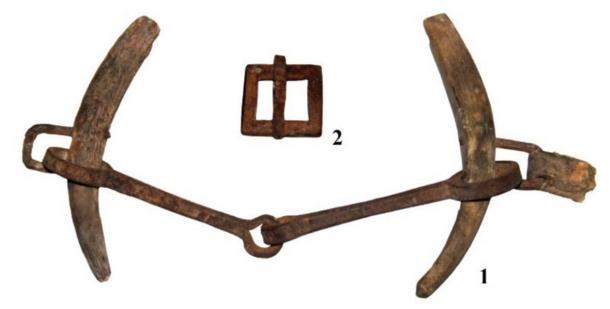 Elements of horse equipment, along with the saddle, were recovered from the burial site. A bit with horn cheekpieces and a buckle. (Nikolai Seregin / CC BY-SA 4.0)