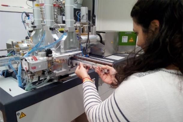 Emmanuelle Casanova one of the Bristol scientists who worked on the project loading the Bristol accelerator mass spectrometer with samples for the new dating technique. (University of Bristol)