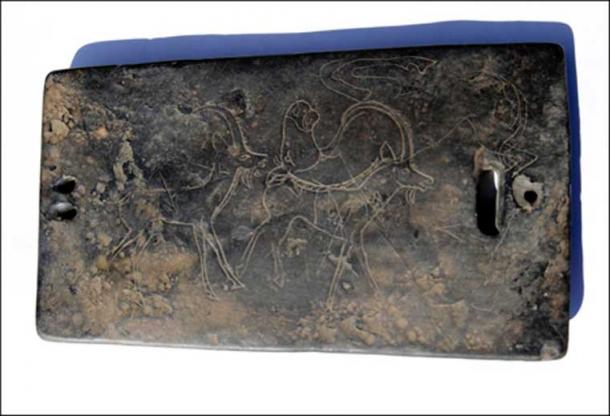 Engraved stone pendant. (Institute for the History of Material Culture)