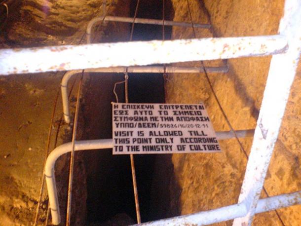 The sign at the end of the part of the Eupalinian aqueduct that is open to the public.