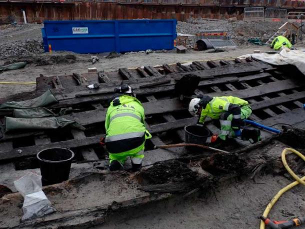 Examining Varbergskoggen 1, one of the medieval Swedish ships. (Arkeologerna)