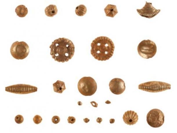 Examples of the Minoan treasure and in particular, gold beads unearthed at the excavation site. (Greece Ministry of Culture and Sports)