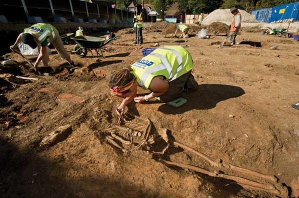 Excavation in progress on a late Medieval and early Modern cemetery site in Chichester where 1,764 burials were recorded in advance of a housing scheme. 