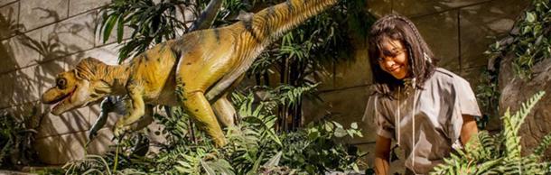 Exhibit at the Creation Museum, Petersburg, Kentucky showing dinosaurs and humans living together.