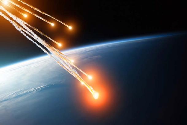 Falling burning flares of several meteorites of asteroids in the Earth's atmosphere. Elements of this image furnished by NASA. (aapsky / Adobe)