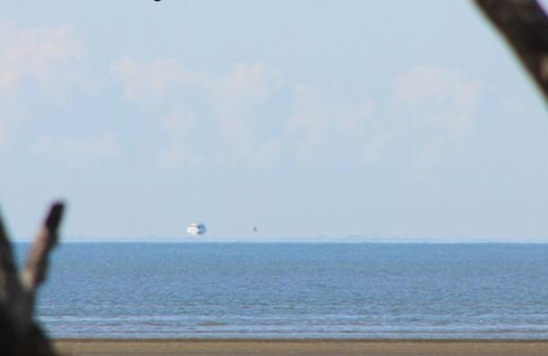 A Fata Morgana off the east coast of Australia that makes it appear as though a ship is floating above the horizon, on Aug. 26, 2012.
