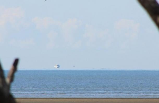 A Fata Morgana off the east coast of Australia that makes it appear as though a ship is floating above the horizon, on Aug. 26, 2012.