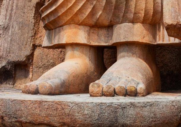 Feet of the Avukana standing statue of Buddha in Sri Lanka. (pzAxe/ Adobe Stock)