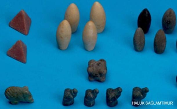 Gaming tokens found in Başur Höyük, Turkey. (Image: Haluk Saglamtimur)
